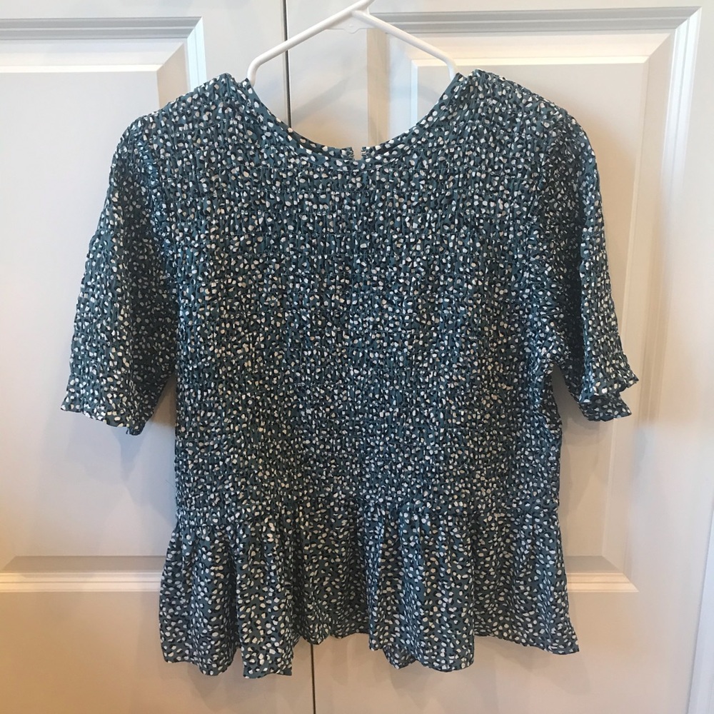 Turquoise peplum top